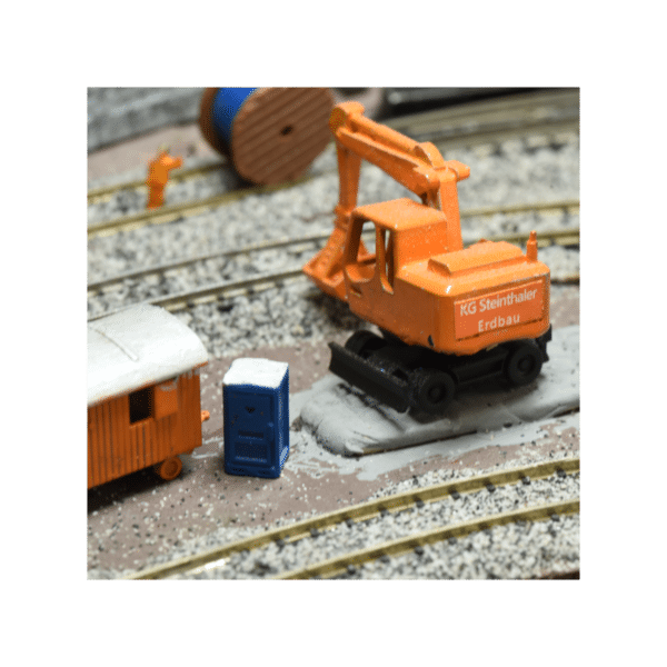 Radbagger orange mit Korb Spur N